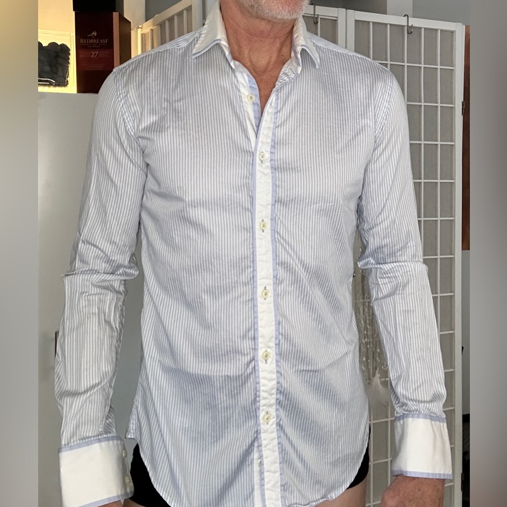 Issac B blue stripped slim fit. Model is a medium, 15 1/2 neck, 34/35 sleeve